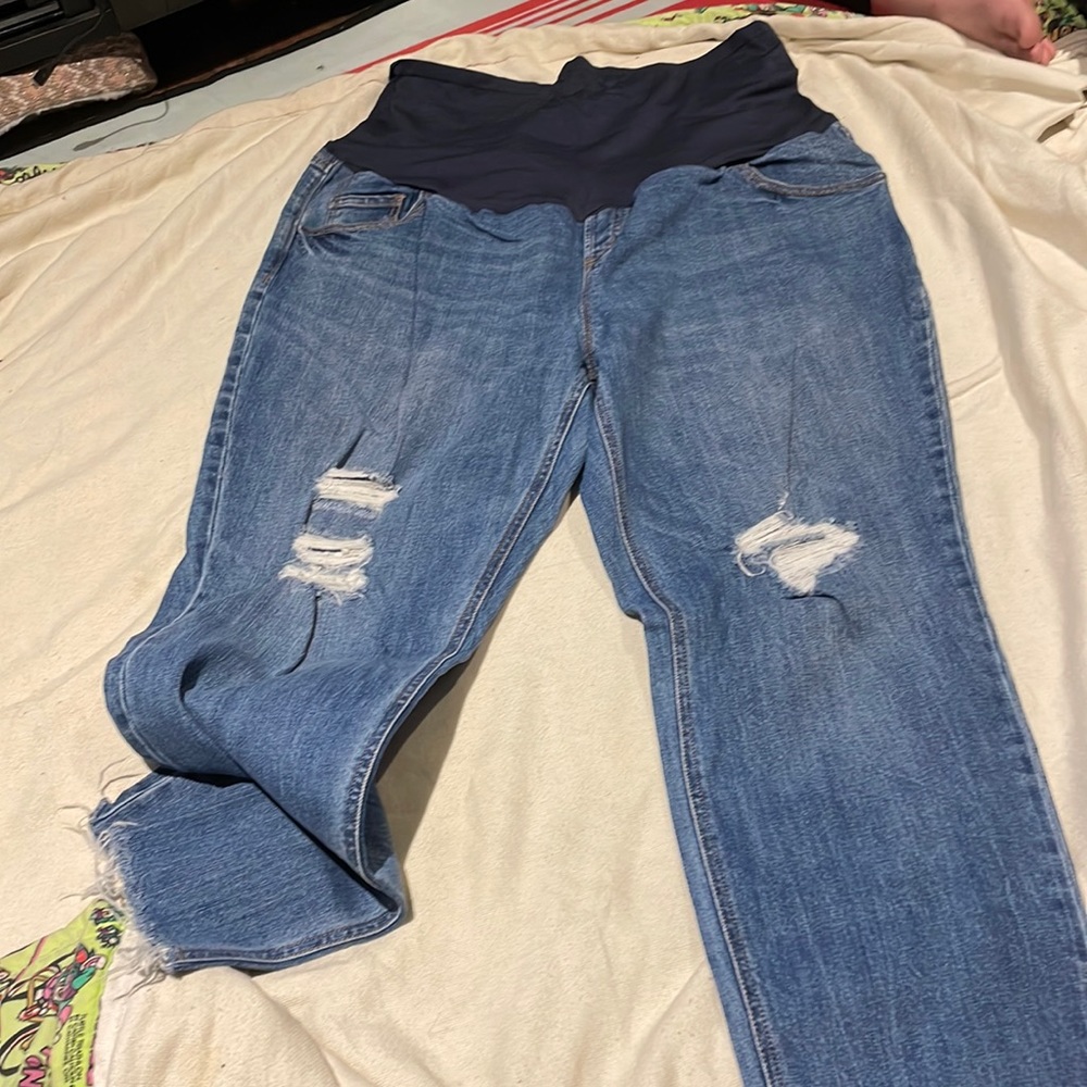 Maternity distressed ankle length maternity jeans.